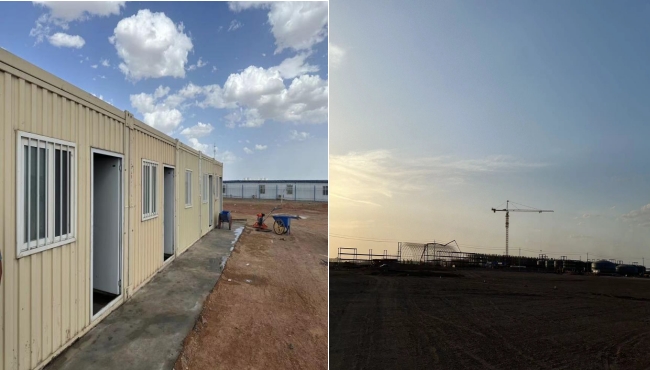 萬頃黃沙映壯志，樓閣巍巍矗風(fēng)沙